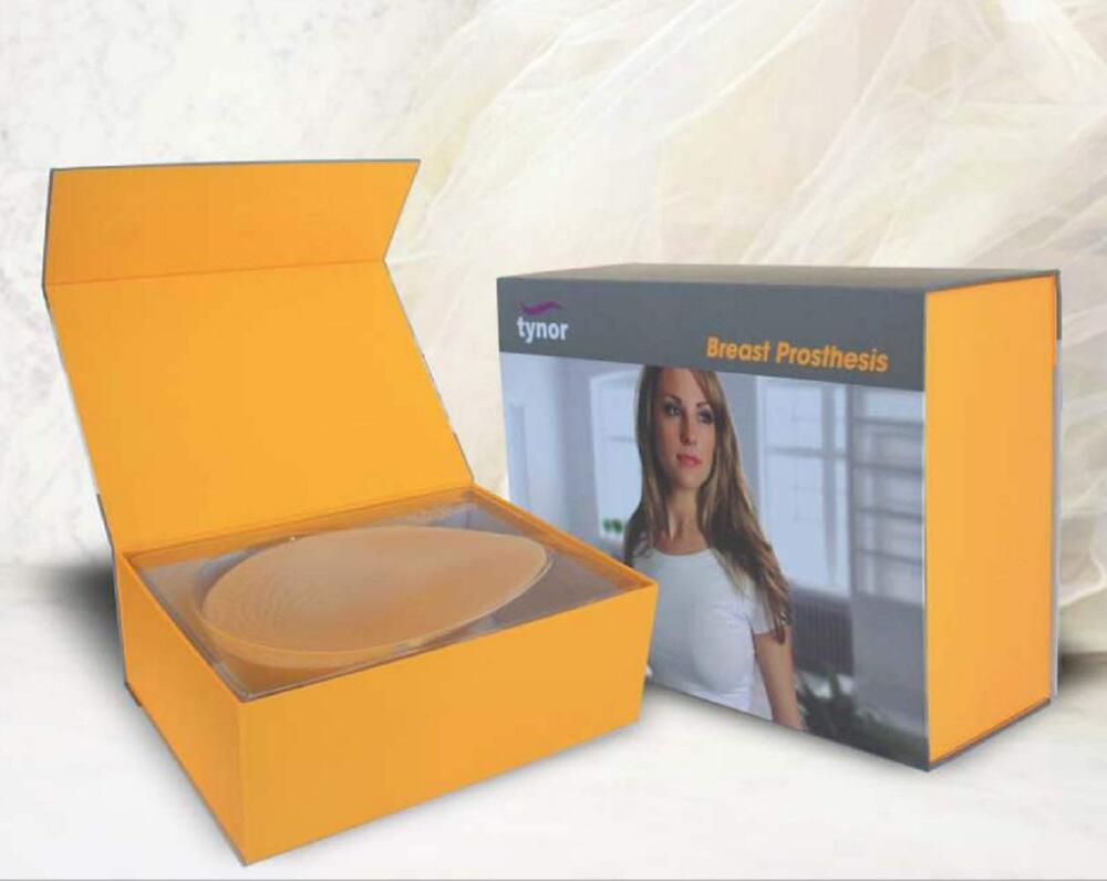 Tynor breast prosthesis packaging with a woman's image on a white background